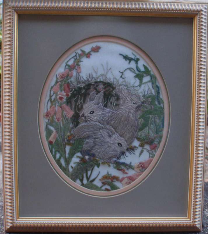 Exquisite embroidery in beautiful frame The Three Bunnies in a gorgeous garden. Stunning