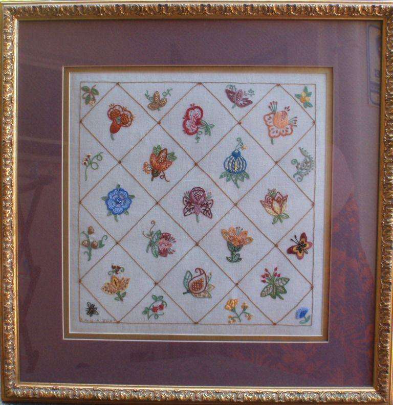 Needle art - beautiful botanical embroidery in lovely frame.