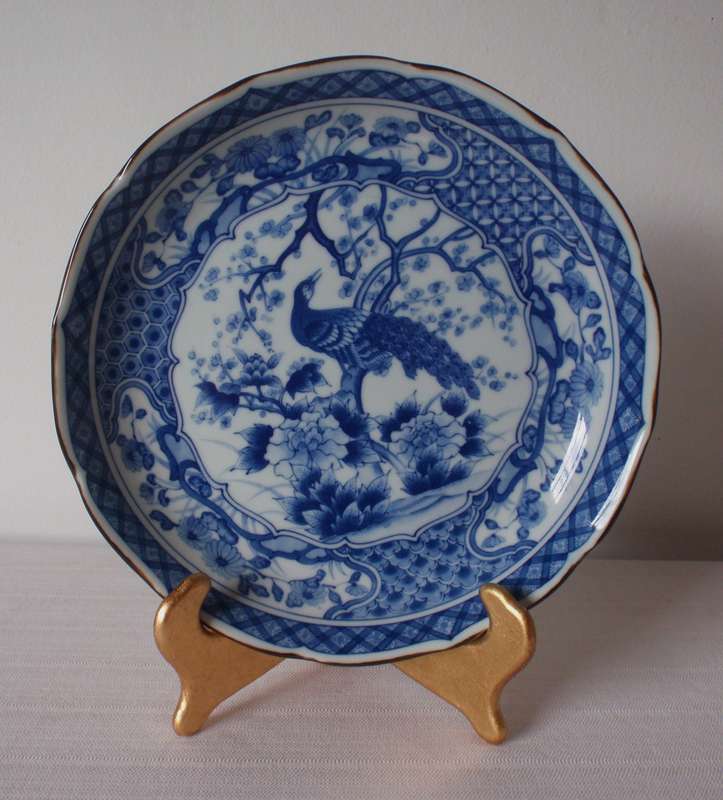 Vintage Japanese Peacock bowl. Has signature on back.