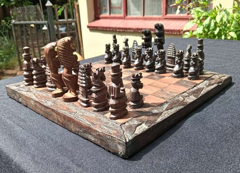 African Hand Carved Wooden Chess Set with Lion King and Queen