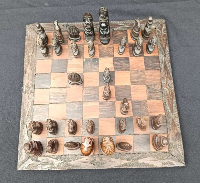 African Hand Carved Wooden Chess Set with Lion King and Queen