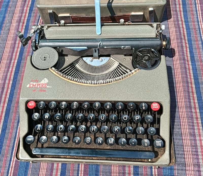 A Pre WW2 1939 Serial Baby Empire De-Luxe Typewriter a Swiss Hermes Baby clone with original Case