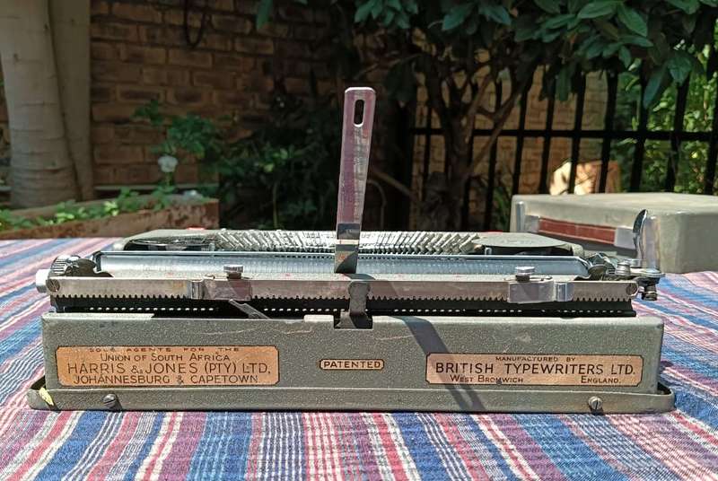 A Pre WW2 1939 Serial Baby Empire De-Luxe Typewriter a Swiss Hermes Baby clone with original Case