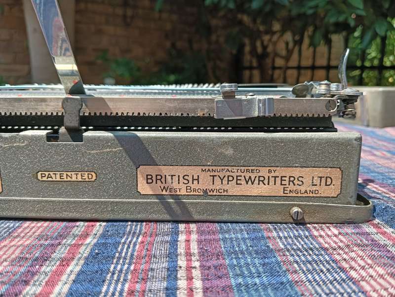 A Pre WW2 1939 Serial Baby Empire De-Luxe Typewriter a Swiss Hermes Baby clone with original Case
