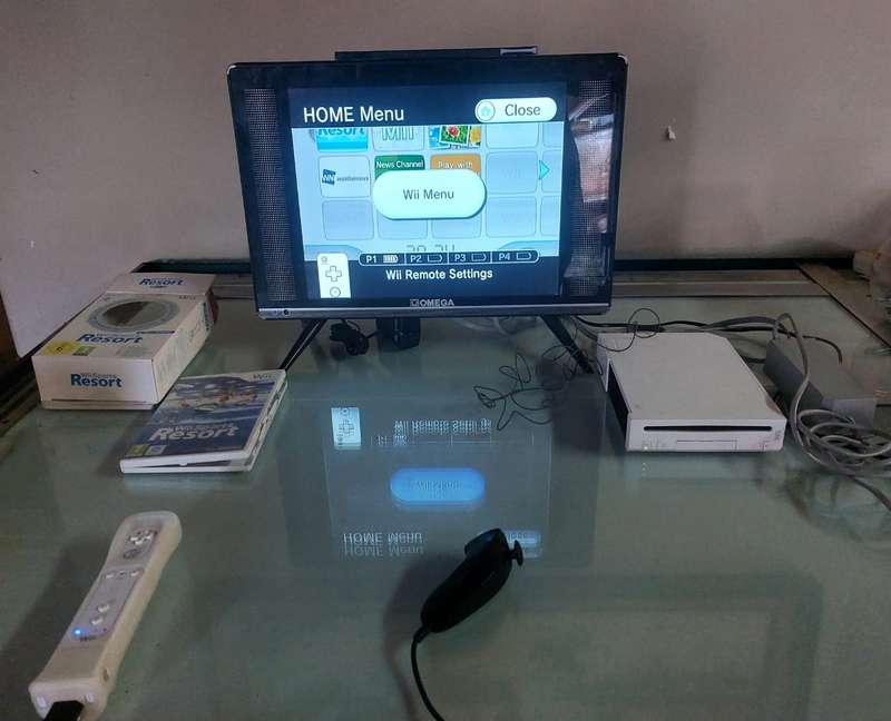 NINTENDO WII Model RVL-001 (EUR) Console, Wii Remote, Power Adapter, RCI Cable, Nunchuk and 2 Games