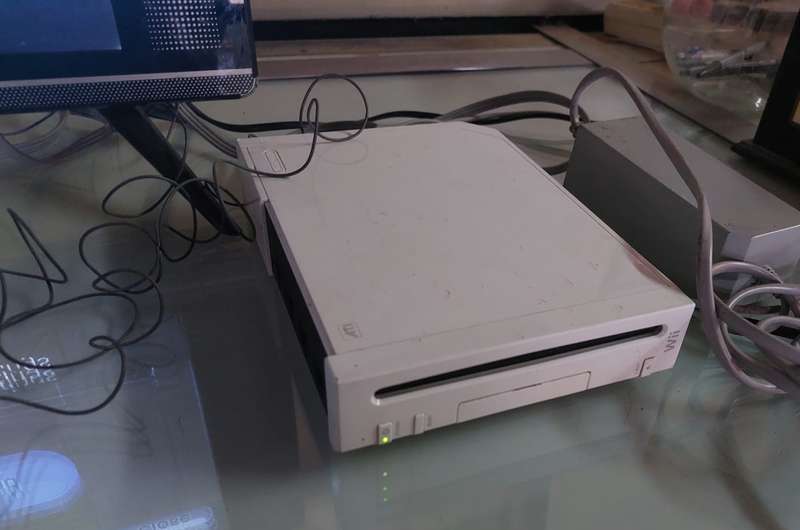 NINTENDO WII Model RVL-001 (EUR) Console, Wii Remote, Power Adapter, RCI Cable, Nunchuk and 2 Games