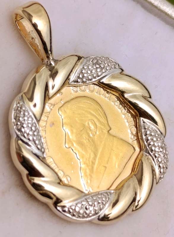 1/10th Kruger on 9ct Diamond Studded Pendant