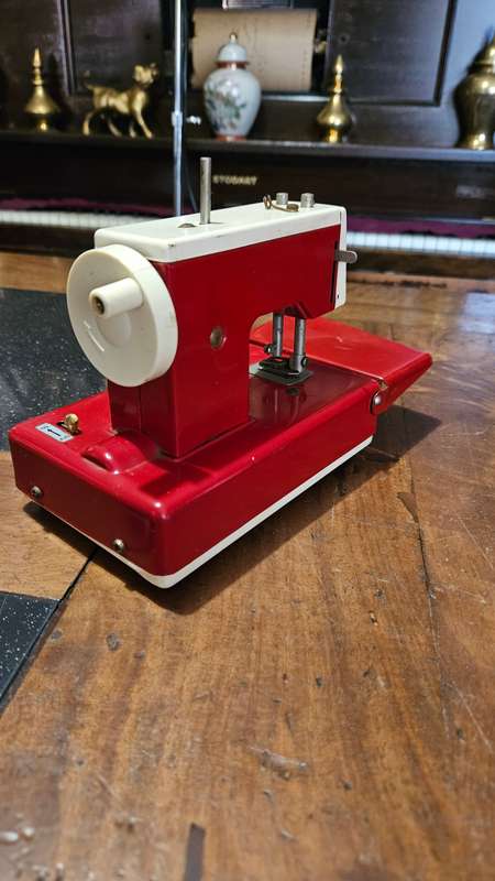 Two Vintage Sewmate Toy Sewing Machines