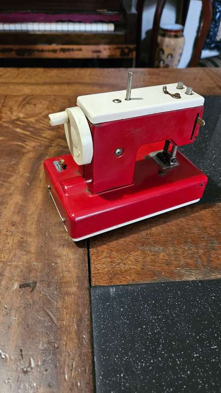 Two Vintage Sewmate Toy Sewing Machines