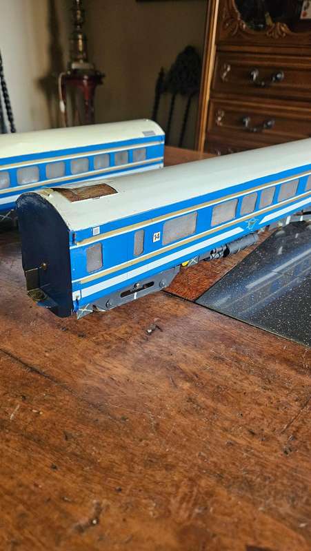 Two Blue Train Coaches