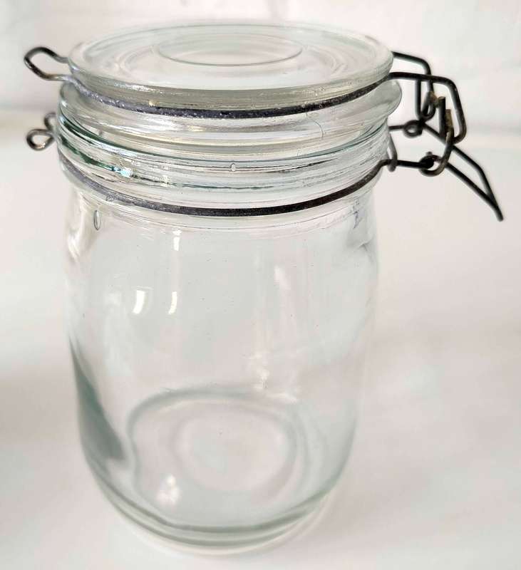 Glass jar with flip open lid
