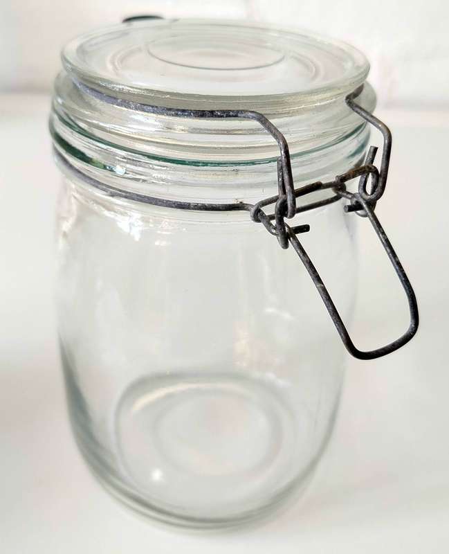 Glass jar with flip open lid