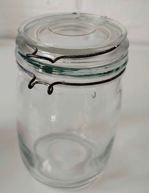 Glass jar with flip open lid