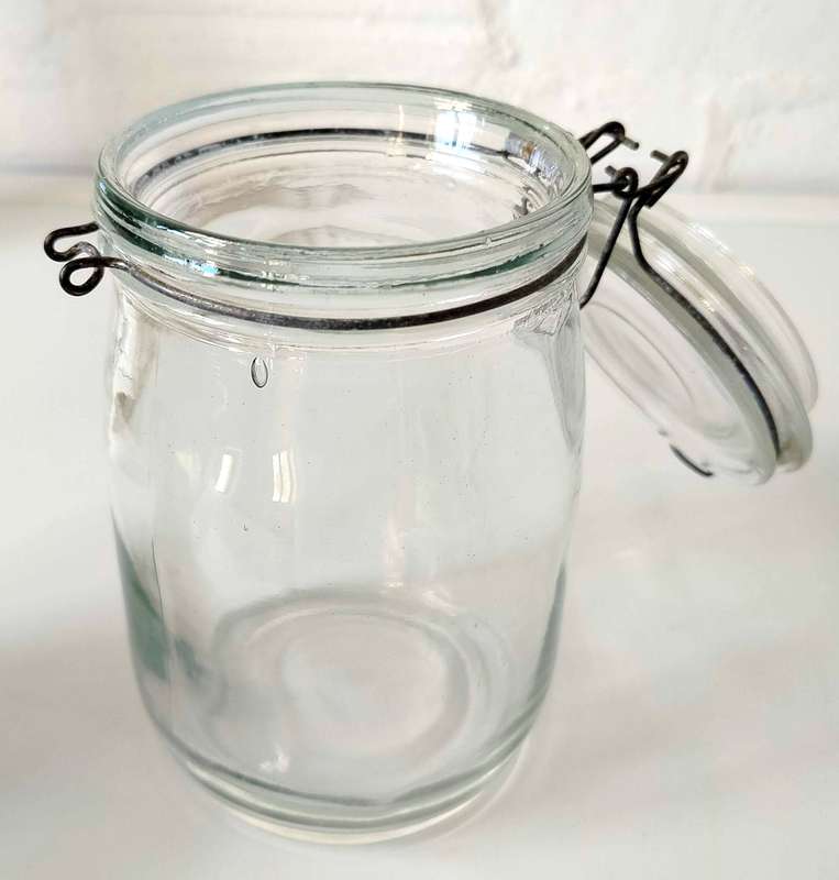 Glass jar with flip open lid
