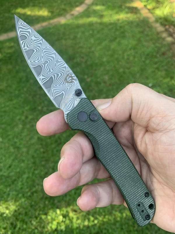 Sixleaf SL-59 Damascus Button Lock Knife