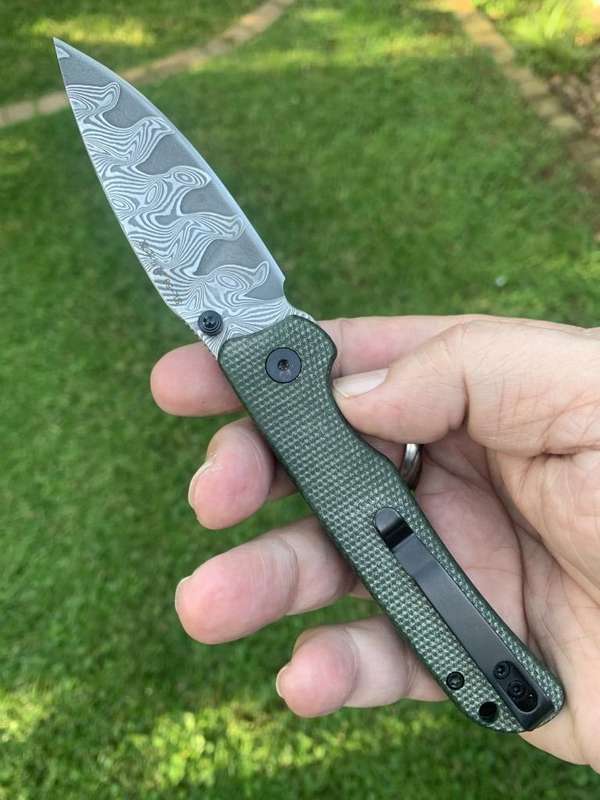 Sixleaf SL-59 Damascus Button Lock Knife