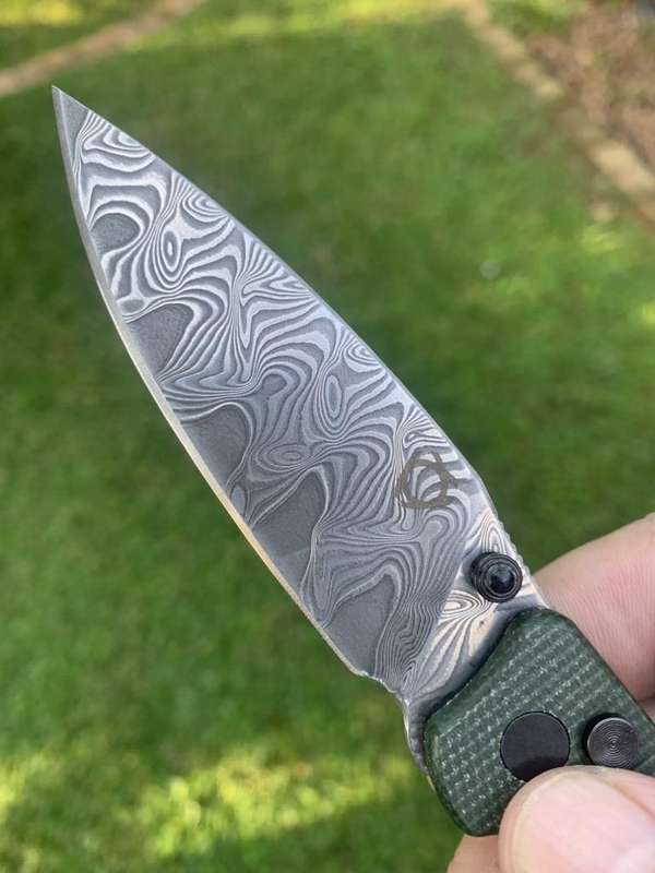 Sixleaf SL-59 Damascus Button Lock Knife