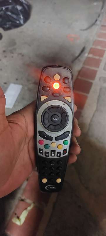 TESTED DSTV REMOTES X4 ALL WORKS BID FOR THE LOT 2 HAS BATTERY COVER AND 2 DOES NOT