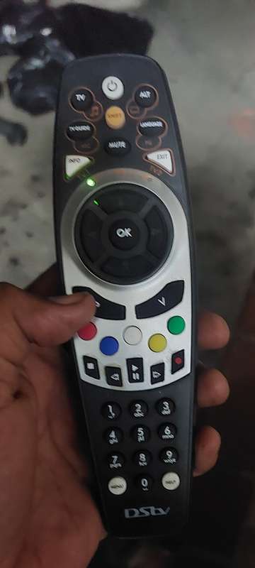 TESTED DSTV REMOTES X4 ALL WORKS BID FOR THE LOT 2 HAS BATTERY COVER AND 2 DOES NOT