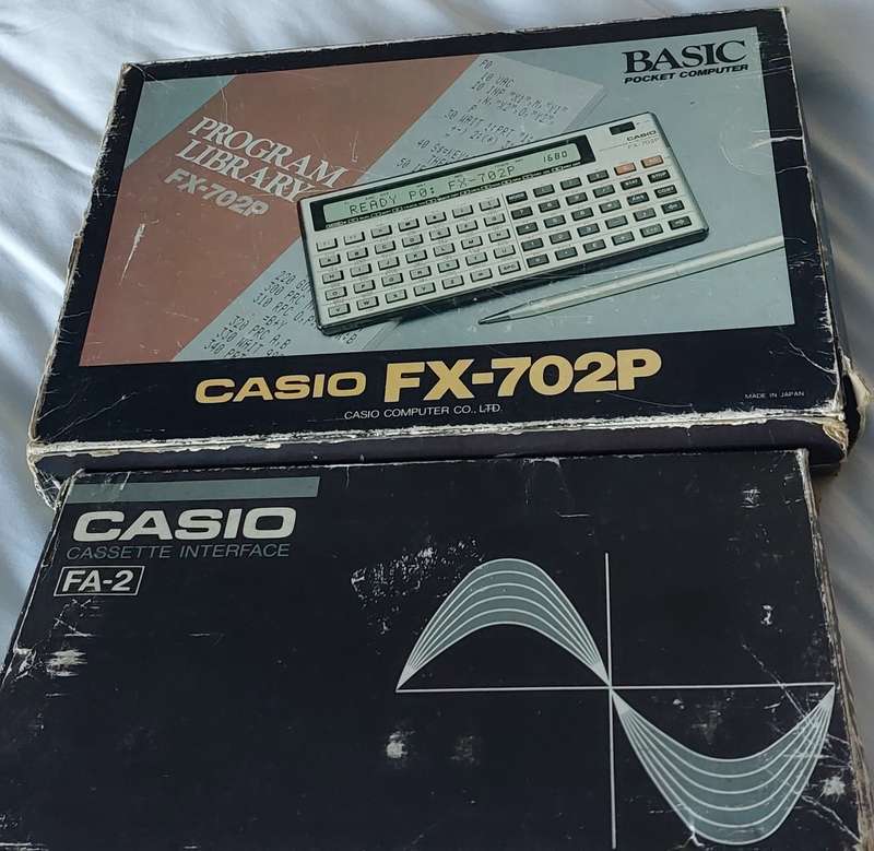 FOR THE COLLECTOR CASSIO BUNDLE FX-702P CALCULATOR AND CASSIO CASSETTE INTERPHASE BOTH WORK TOGETHER