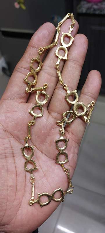 vintage neck chain absolutely stunning unsure of material nice weight.