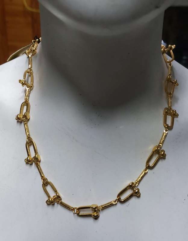 vintage neck chain absolutely stunning unsure of material nice weight.