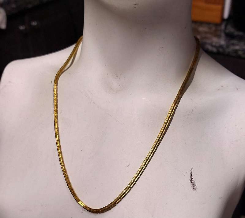 vintage neck chain absolutely stunning unsure of material nice weight.