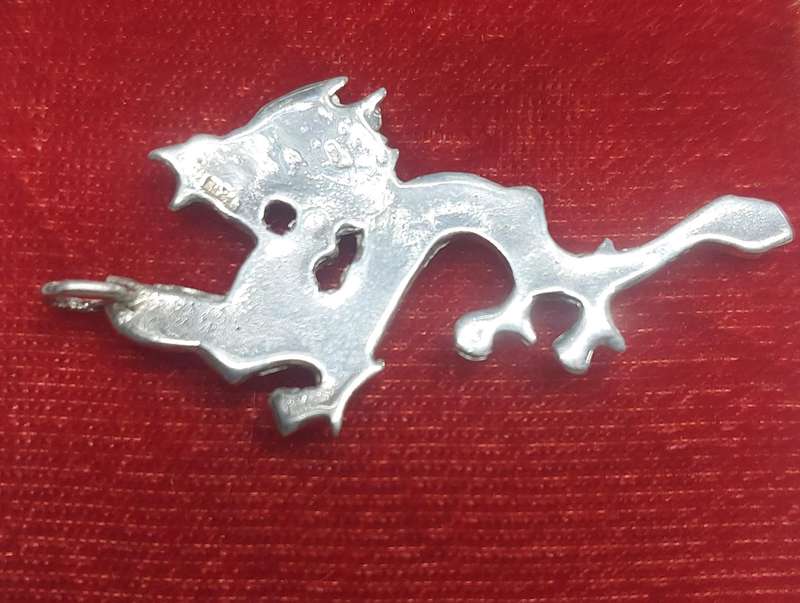vintage solid silver dragon 5cm side to side pendant clearly marked