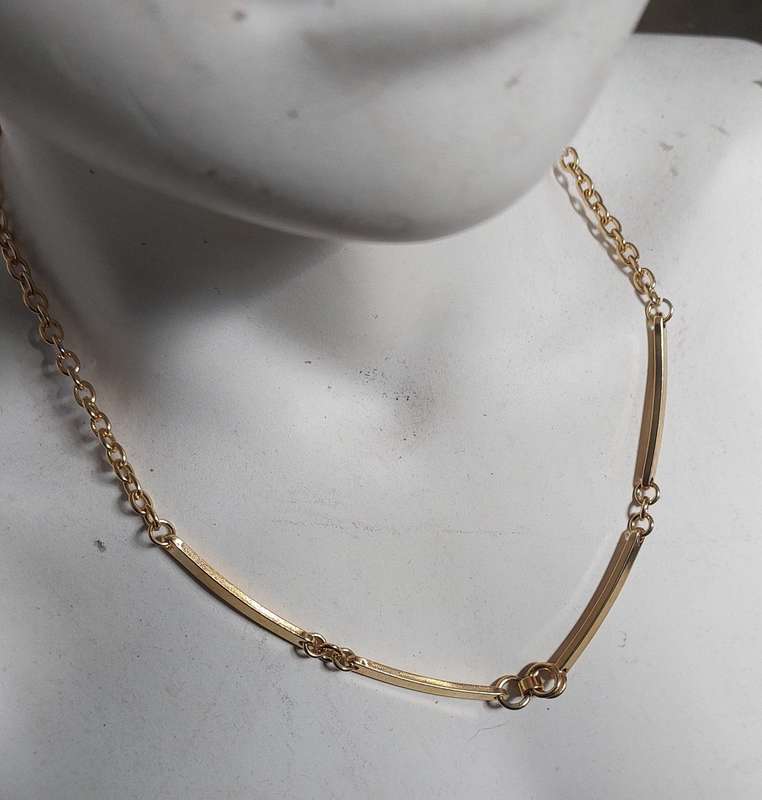 vintage neck chain absolutely stunning unsure of material nice weight.