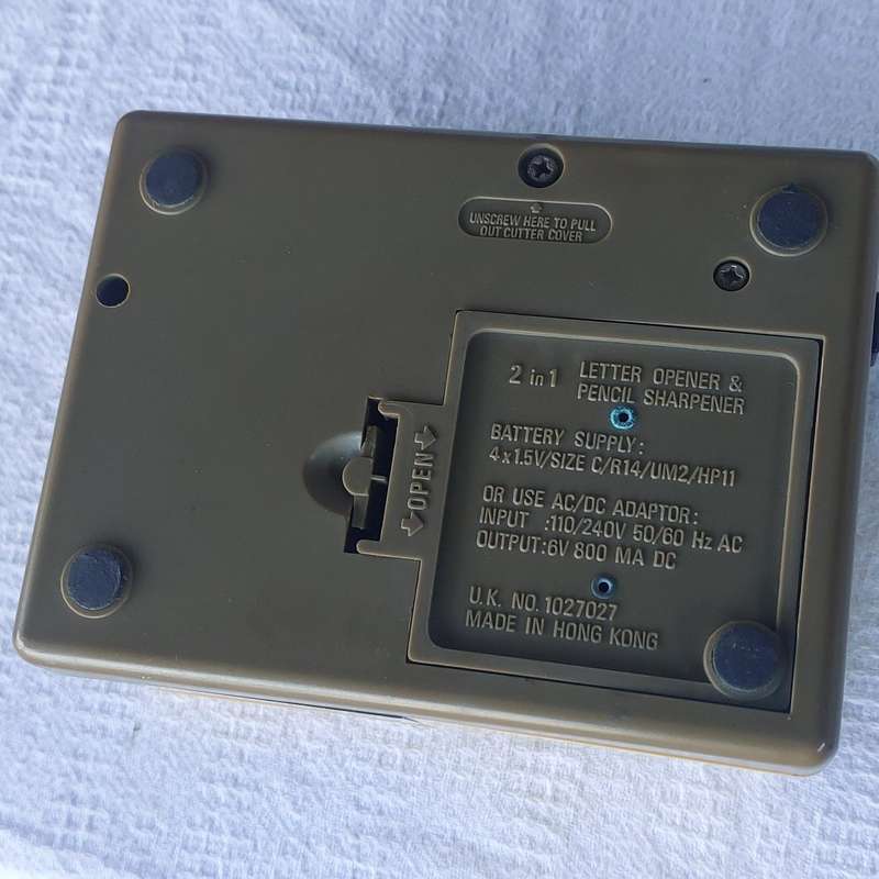 Phillips envelope opener and pencil sharpener