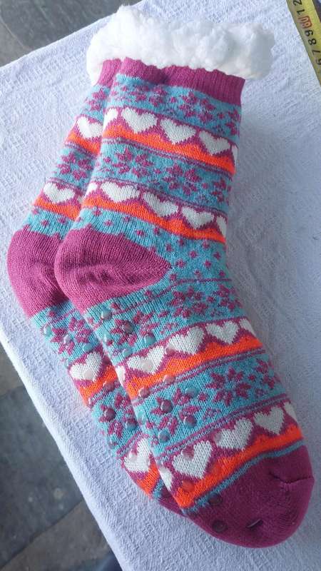 Winter warmer sock with anti slip studs on the bottom.
