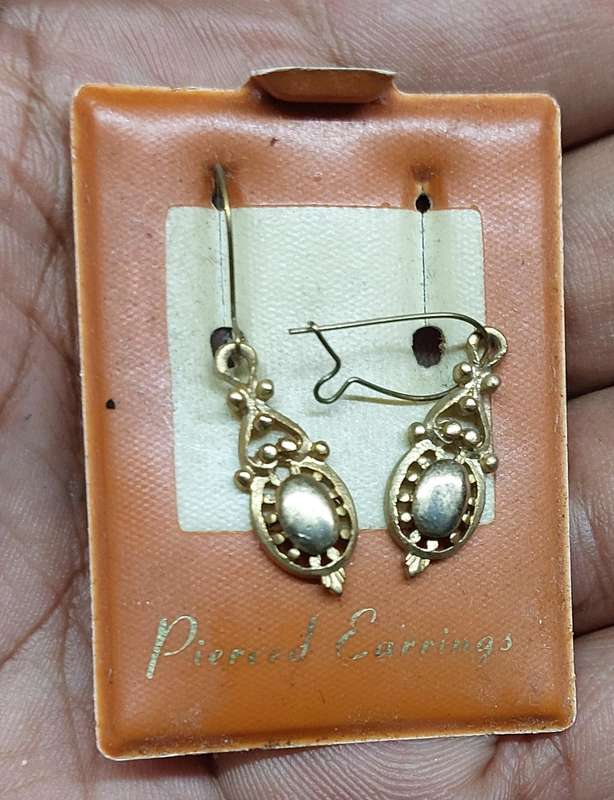 Vintage earrings unsure of material from the 80s