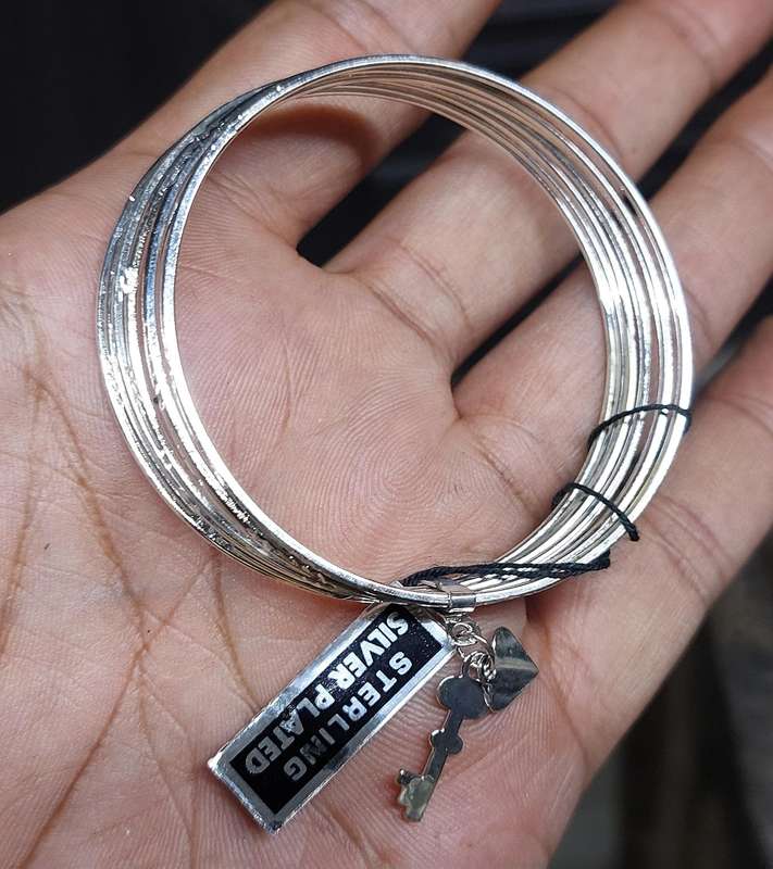 Vintage  Kids bangle with charms super stunning money back guarantee