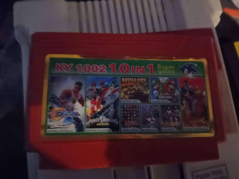 10 in 1  TV Game Cartridge ( includes Super Contra  )