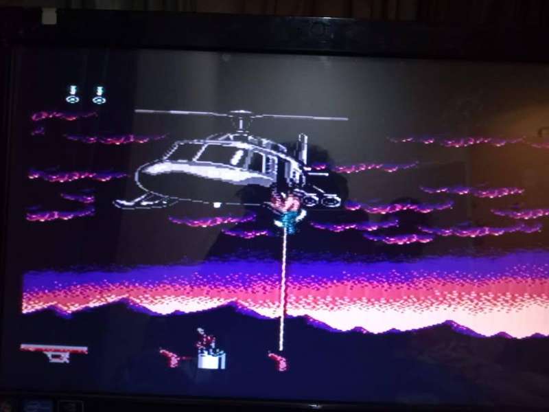 10 in 1  TV Game Cartridge ( includes Super Contra  )