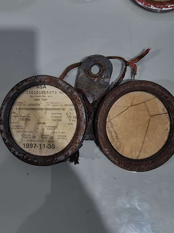 LOT VINTAGE MOTORCYCLE LICENCE DISK HOLDERS