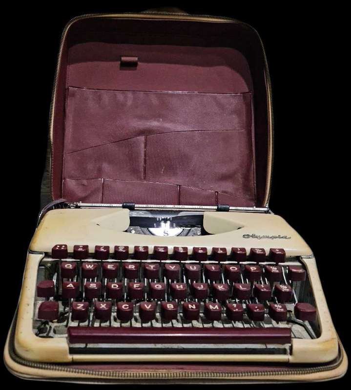 VINTAGE OLYMPIA PORTABLE TYPEWRITER