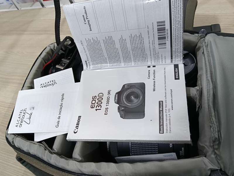 Canon EOS 1300D with 2 lenses_18-55mm_75-300mm zoom.