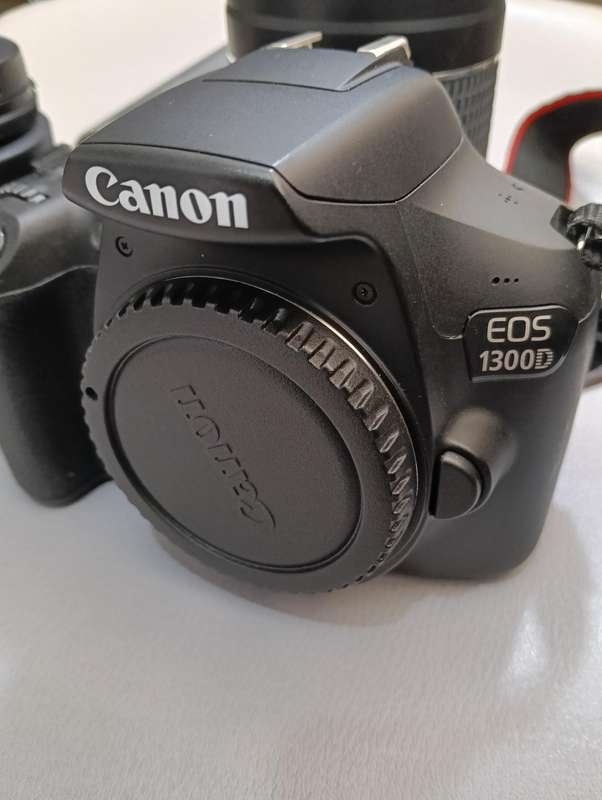 Canon EOS 1300D with 2 lenses_18-55mm_75-300mm zoom.
