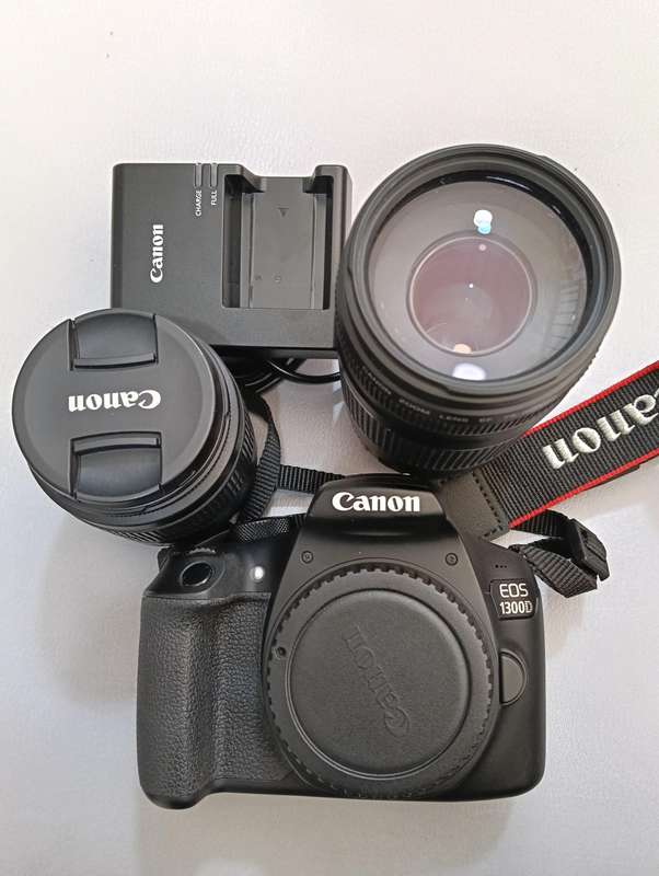 Canon EOS 1300D with 2 lenses_18-55mm_75-300mm zoom.