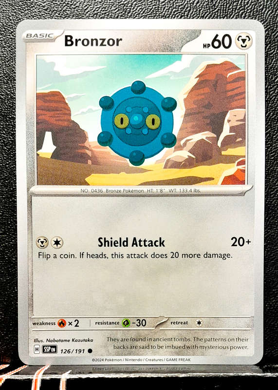 Pokemon Card - Bronzor 126/191- Common - Surging Sparks NM