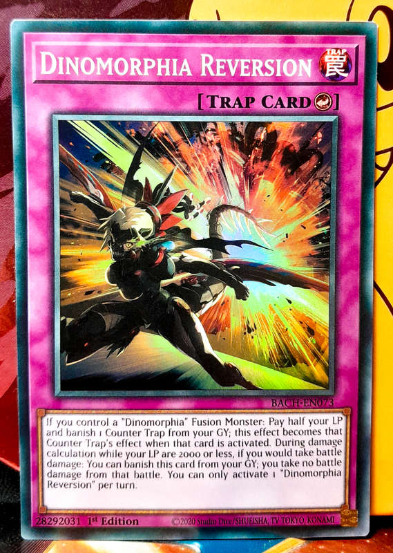 Yu-Gi-Oh! Card - Dinomorphia Reversion - 1st Edition - Super Rare - BACH-EN073 - NM