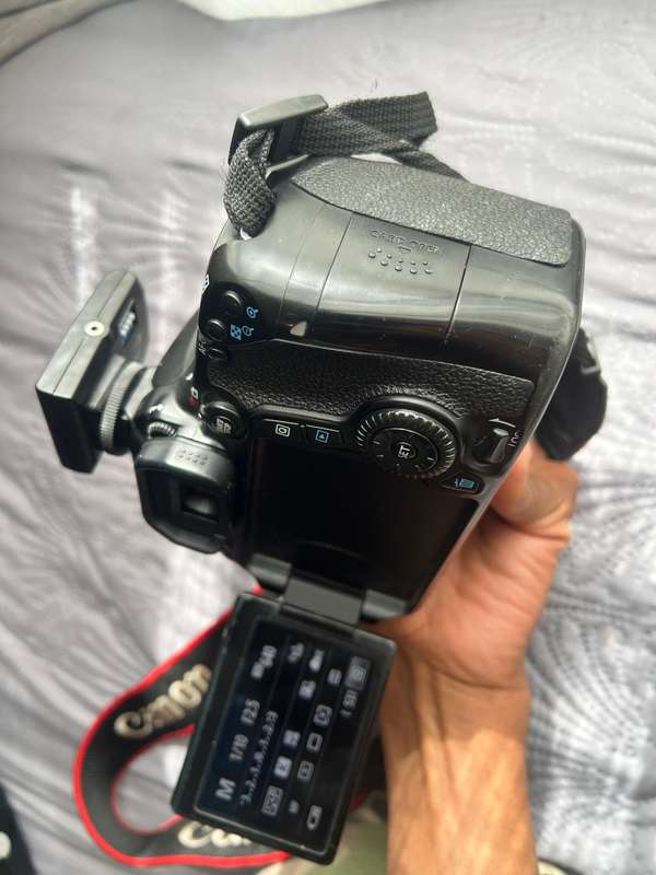 Canon 70D DSLR Camera + 50mm 1.2 Canon lens + Godox TT520 II Speedlight + Mixbox professional Tripod