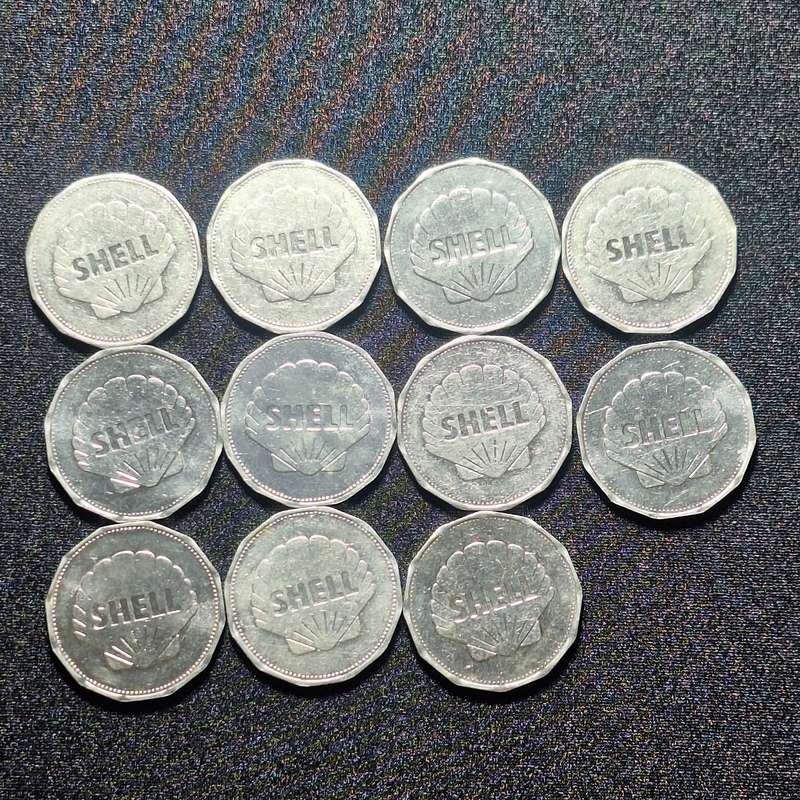 11 x VINTAGE SHELL COMMEMORATIVE MAN IN FLIGHT TOKENS