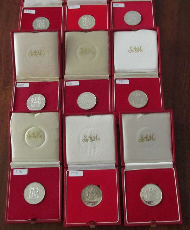 9 UNC. SILVER RANDS IN S.A.M BOXES
