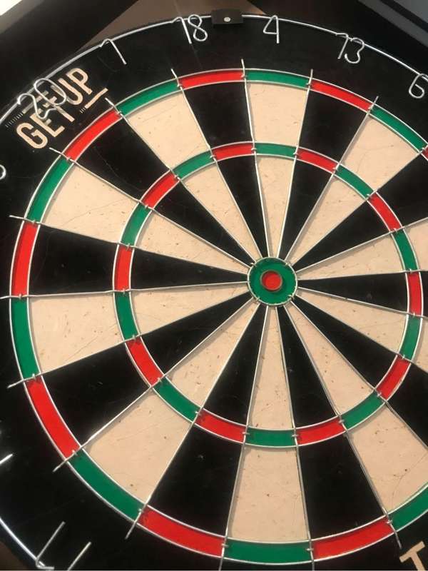 Dartboard in cabinet