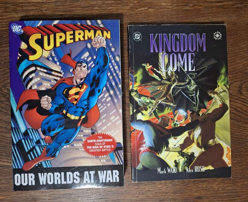 2x DC books Kingdom Come and Superman our worlds at war