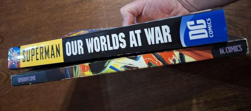 2x DC books Kingdom Come and Superman our worlds at war