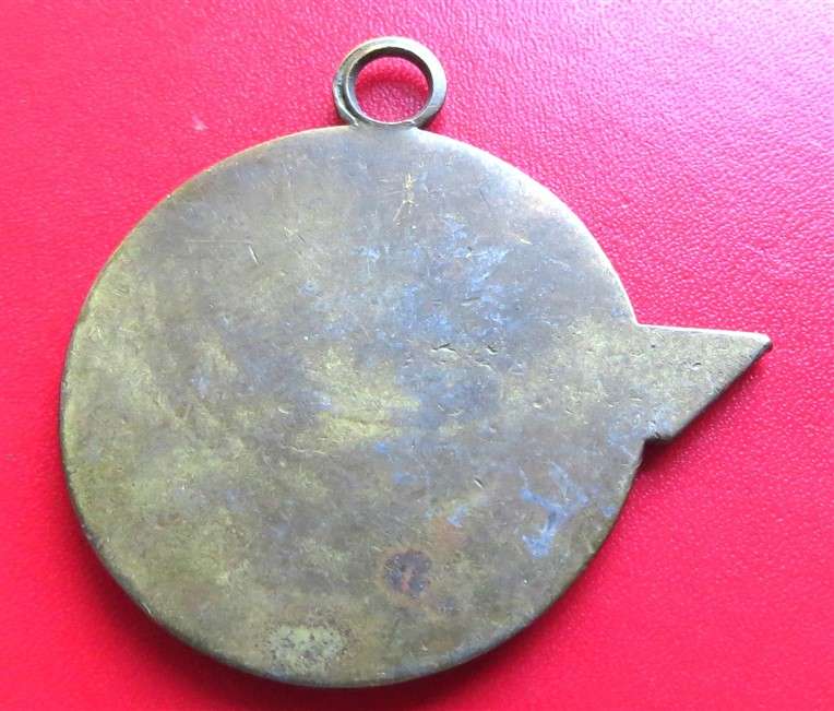 Unknown Winged Helmet or Red Indian Pendant