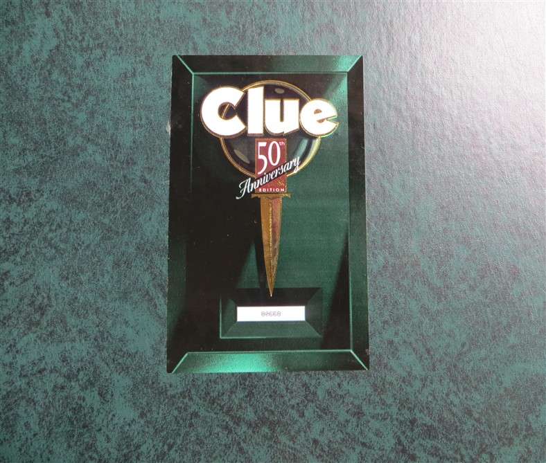 50th Anniversary Edition of Clue in Tin with Metal Murder Weapons & Players